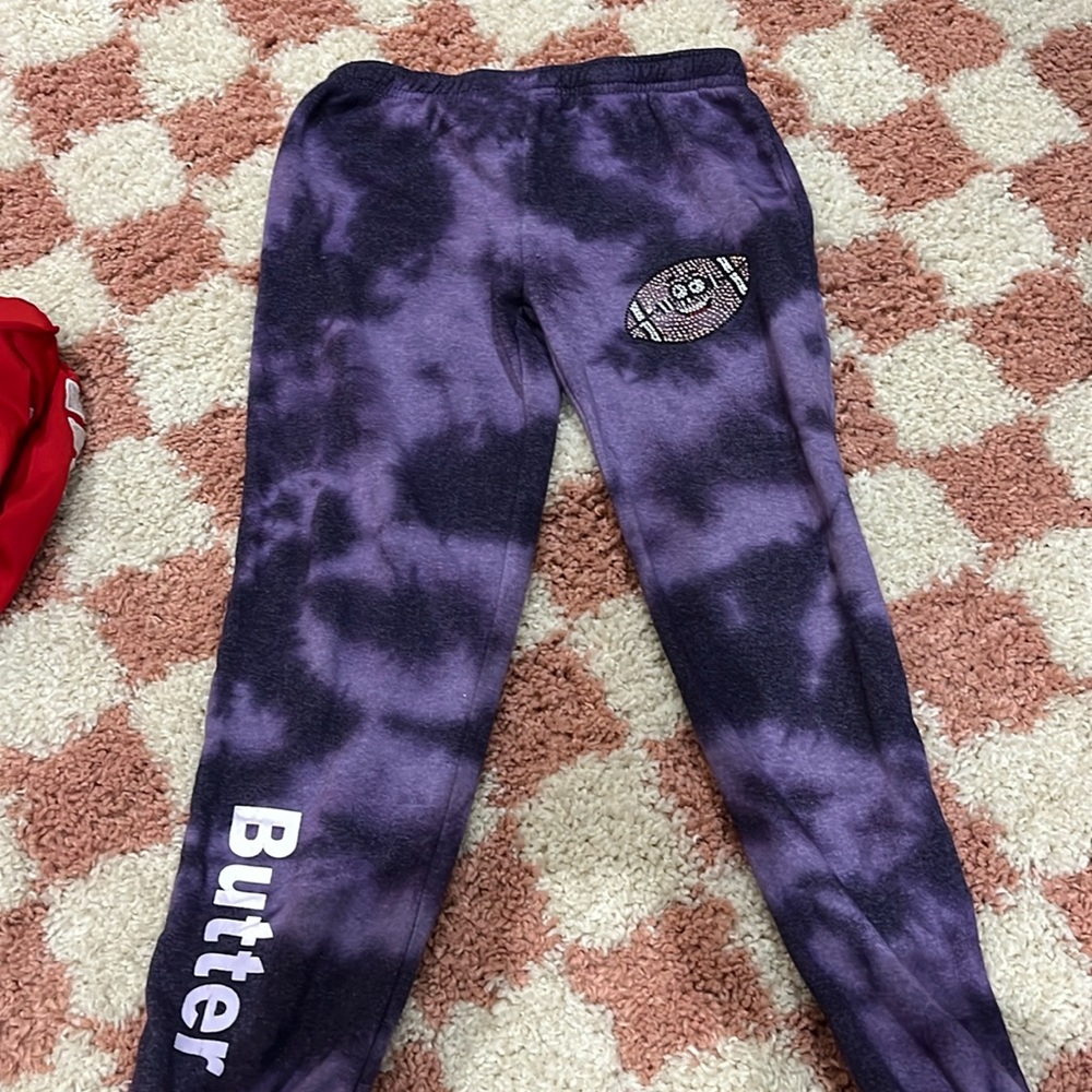 3 pairs of girls Butter sweatpants - purple are large and the other two are med